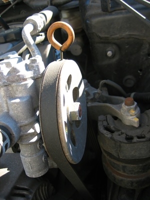 How to Change the Tensioner Pulley on a Cavalier