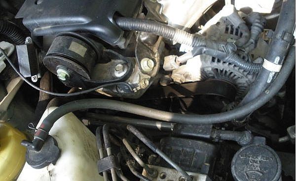 How to change the serpentine belt on a Toyota Camry 4 cyl. car