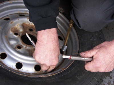 How to Replace a Spare Doughnut Tire