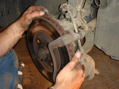 How to Replace Front Brake Rotors on a 2003 Chevy Silverado